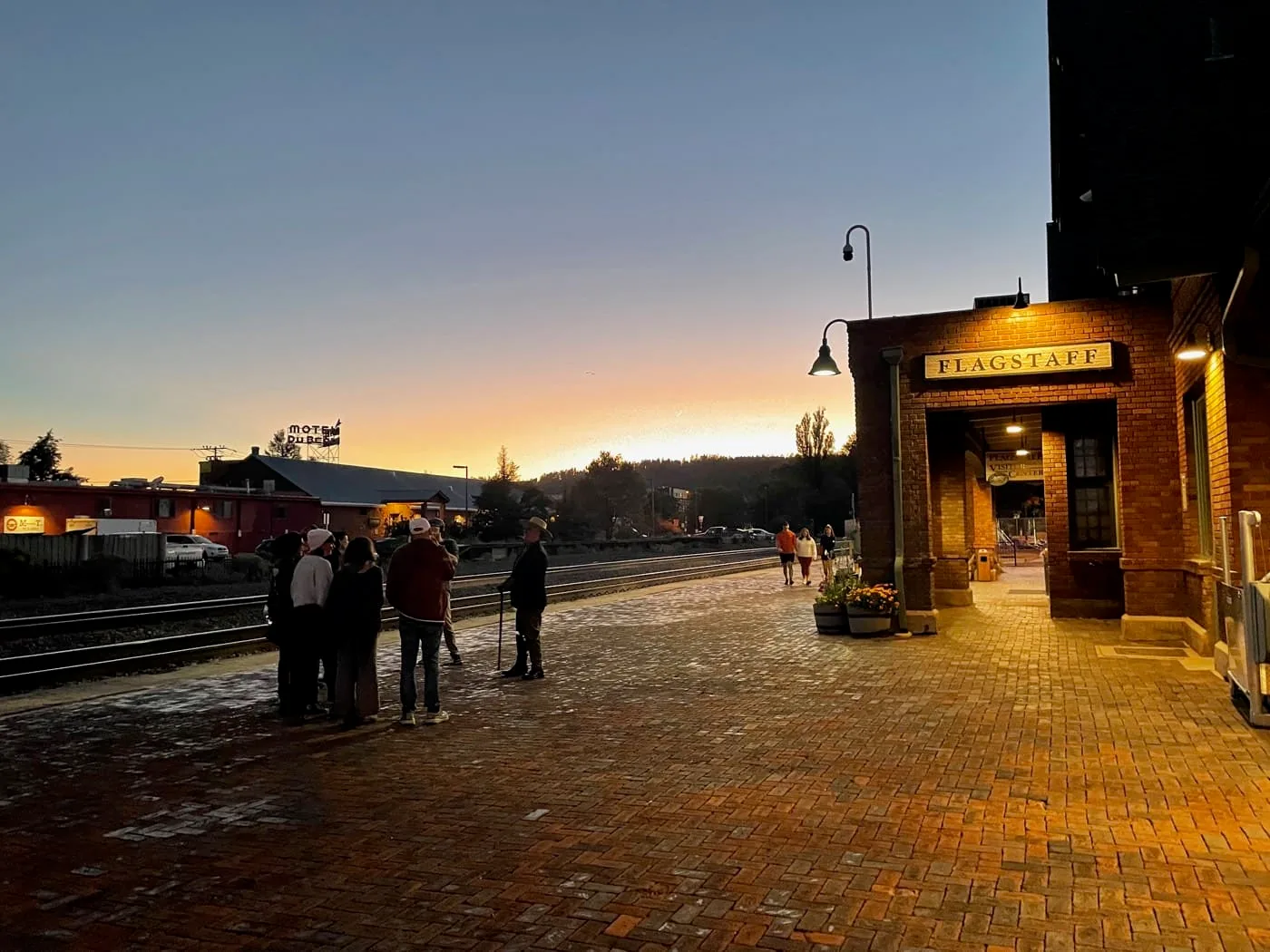 The Flagstaff train depot at sunset with the tracks that divide downtown from the Southside